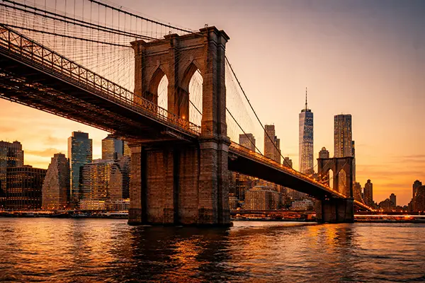 Brooklyn Bridge at twilight - car service to Newark Airport from Brooklyn