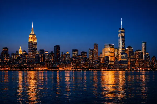Manhattan skyline at dusk - EWR car service from Midtown and Downtown