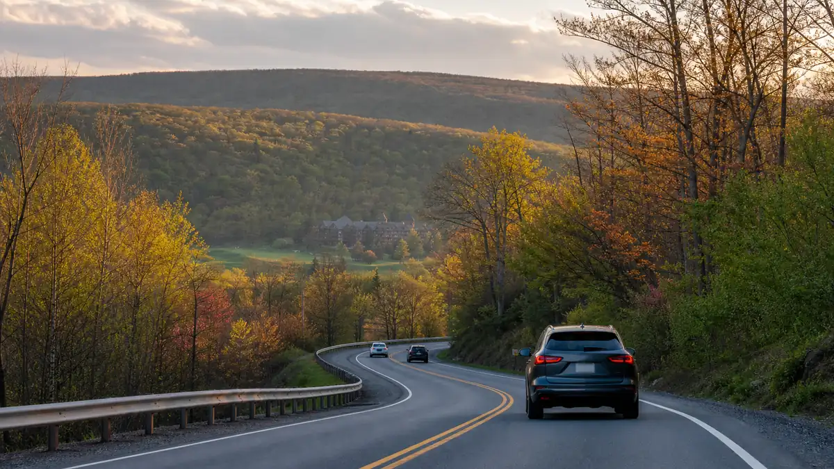 Driving to Crystal Springs in Hamburg for the NJ Wine & Food Festival: a scenic two-lane road winding through forested northwest New Jersey hills