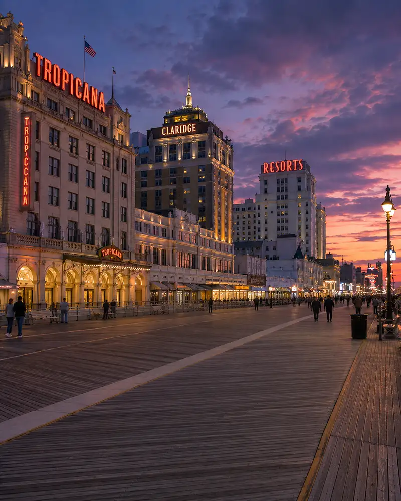 Atlantic City Boardwalk historic hotels Tropicana, Claridge, and Resorts at dusk